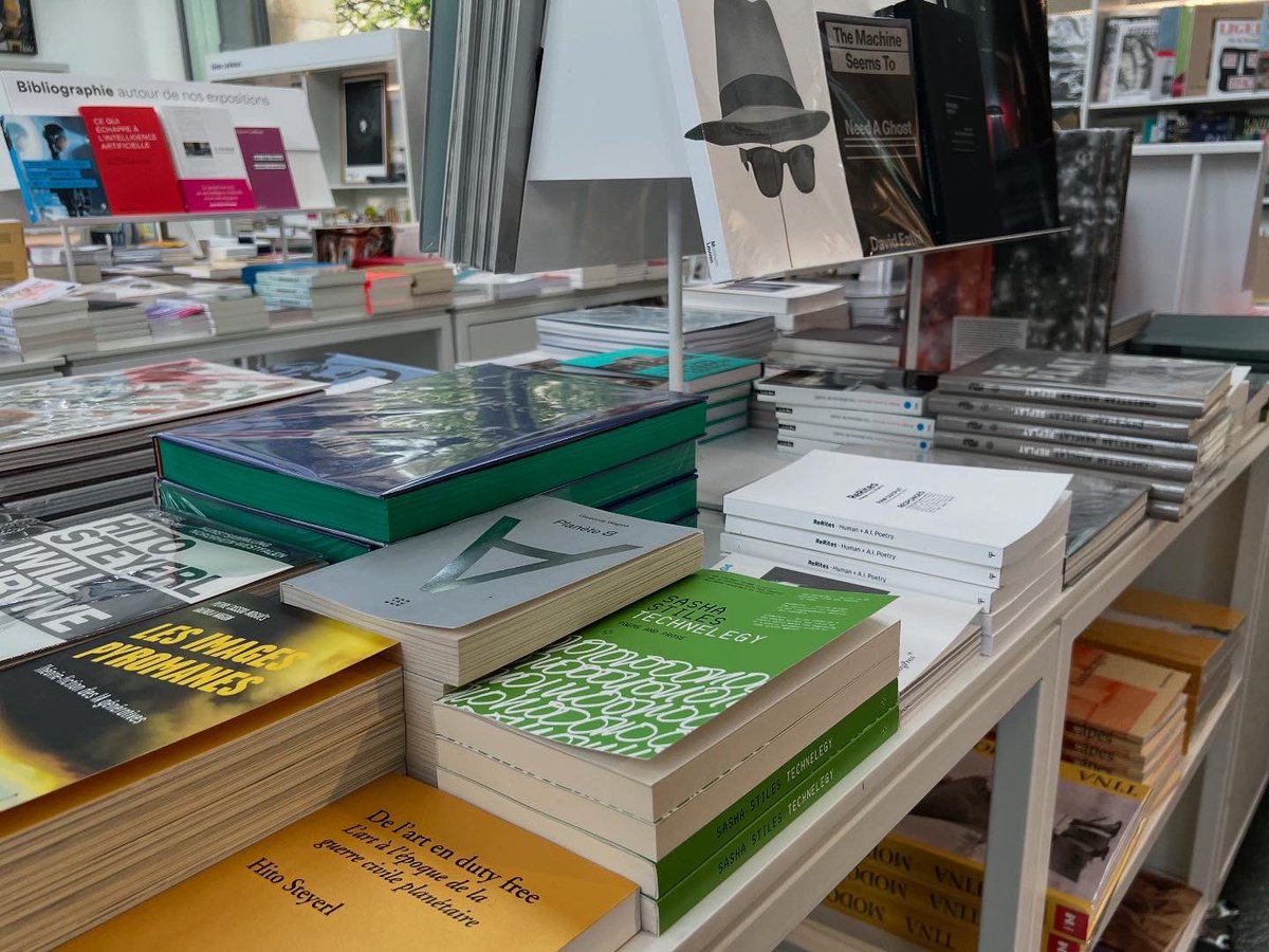 sashastiles's tweet image. It’s great to see the new UK paperback edition of my 2021 poetry-art book #Technelegy in the @jeudepaume bookshop — and in fine company! 💚