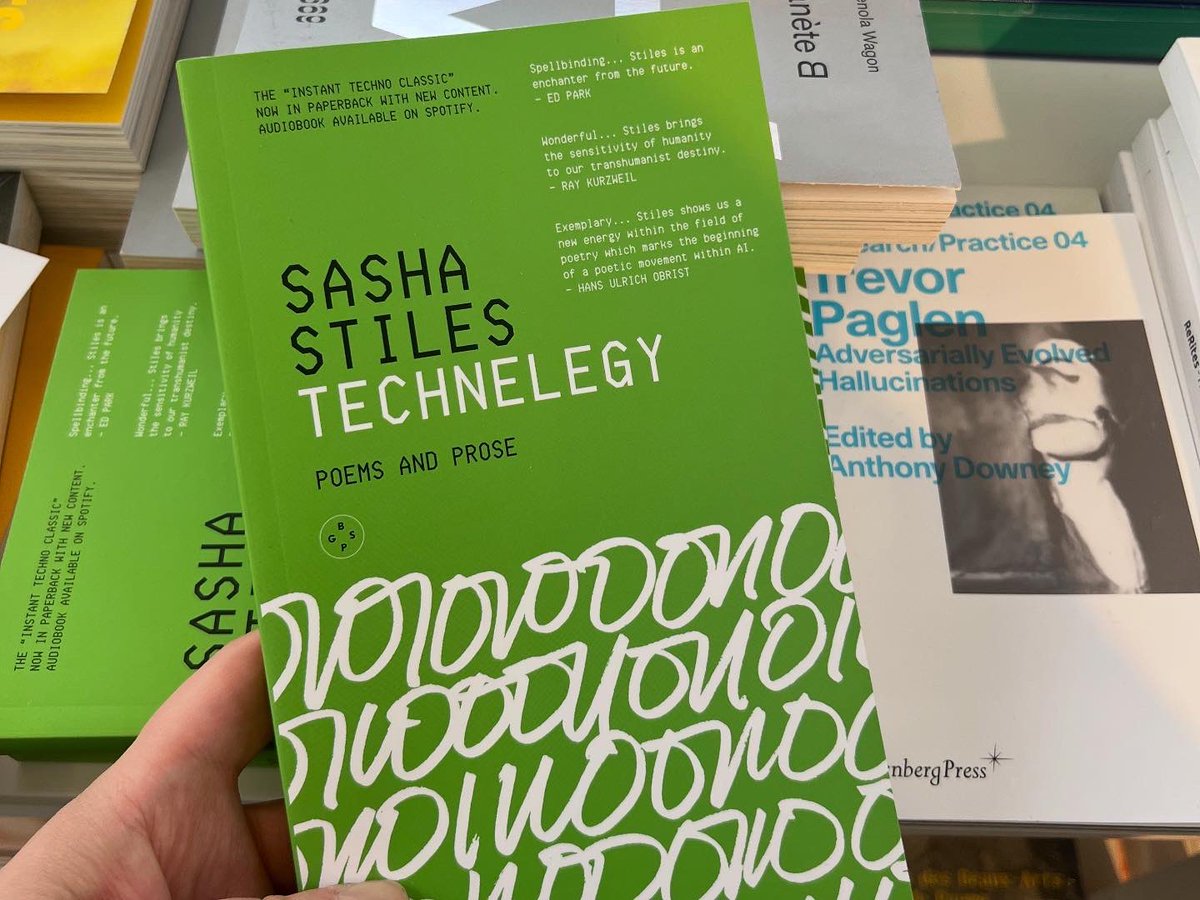 sashastiles's tweet image. It’s great to see the new UK paperback edition of my 2021 poetry-art book #Technelegy in the @jeudepaume bookshop — and in fine company! 💚
