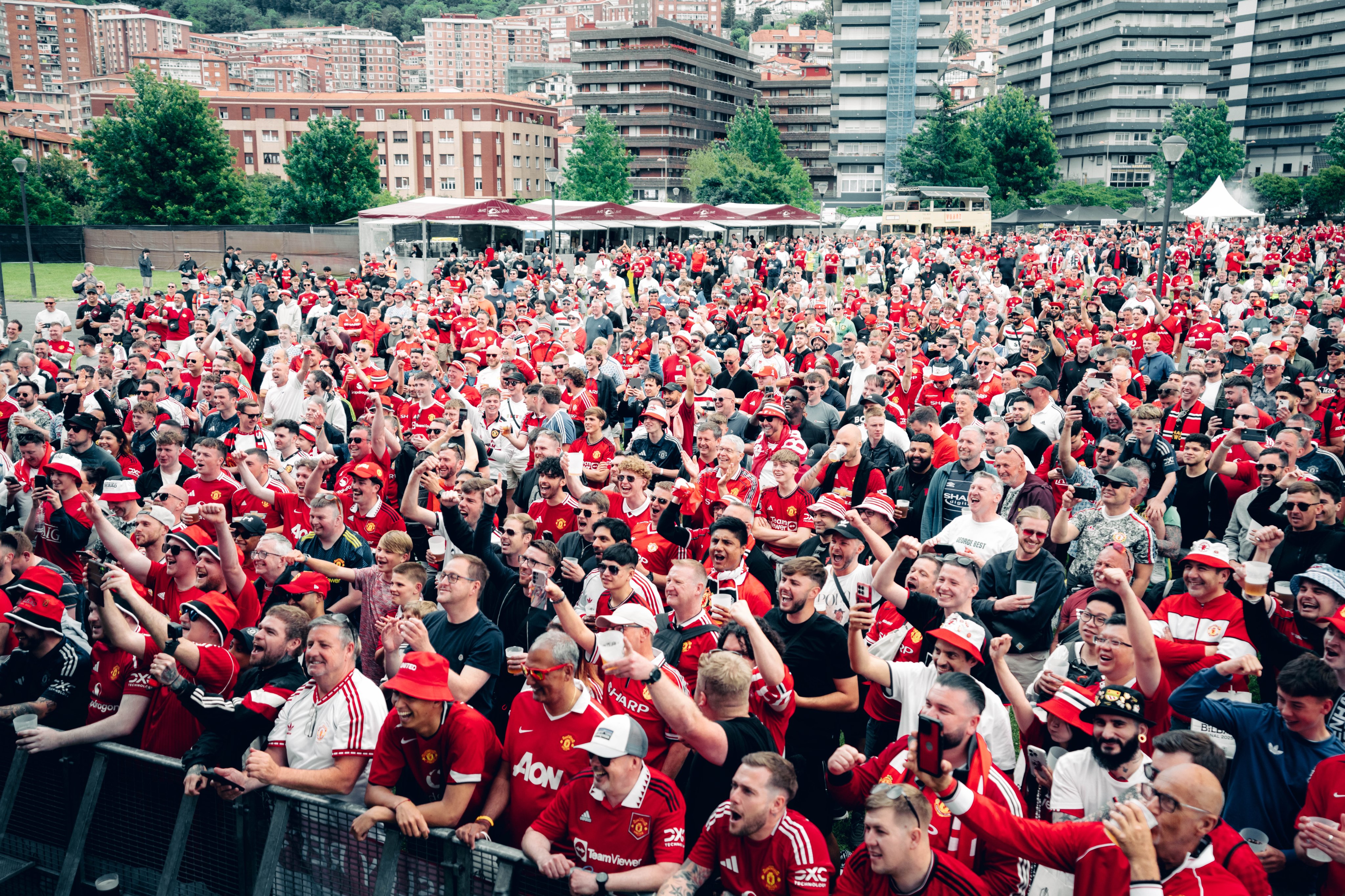 United fans chant and enjoy the atmosphere at our fan park in Bilbao.