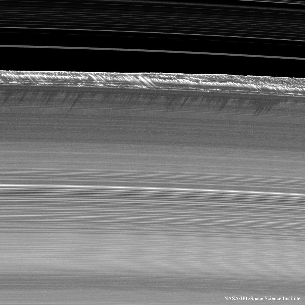 Intriguing: Propeller Shadows on Saturn's Rings 

(Credit: NASA, JPL-Caltech, Space Science Institute)