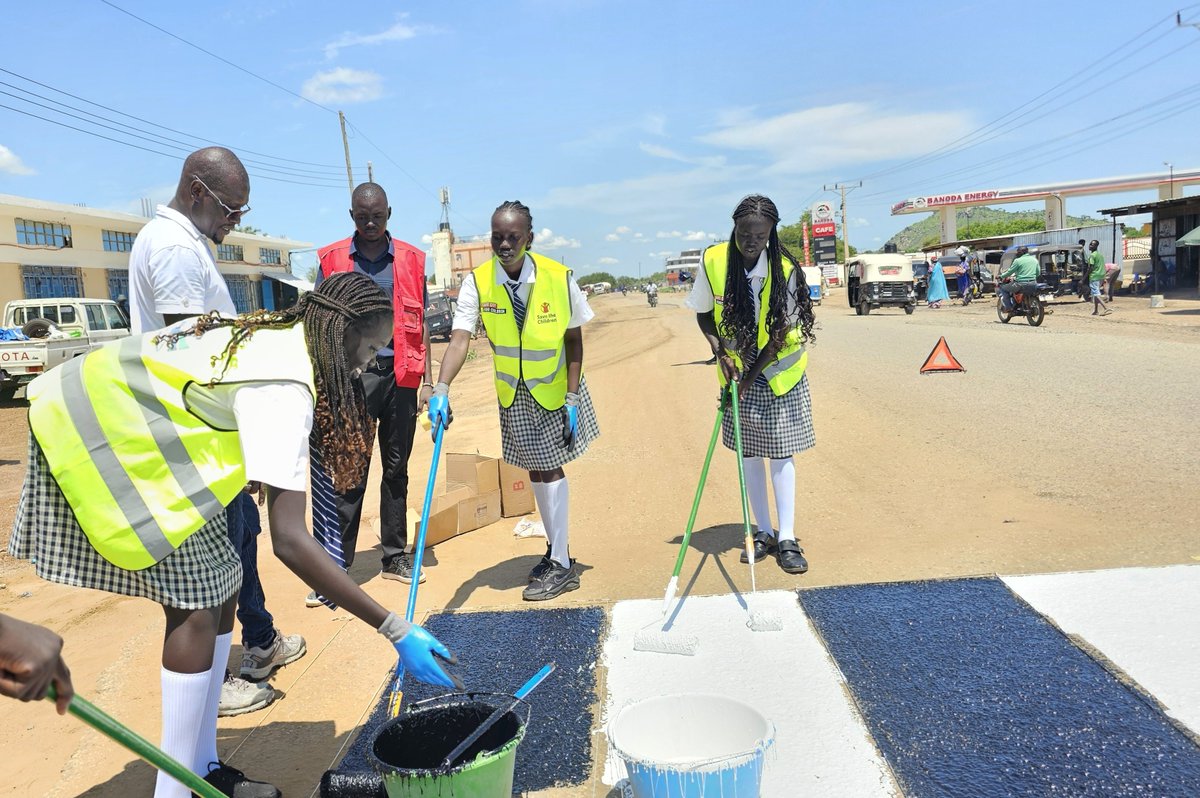 SCSouthSudan's tweet photo. In South Sudan, we're making roads safe for children as officials and children call for increased awareness of road safety in South Sudan. @SCSouthSudan supported a zebra painting activity, a child-led road safety awareness campaign in Juba, on Wednesday 21st. #SSOX https://t.co/u5rY87leLn