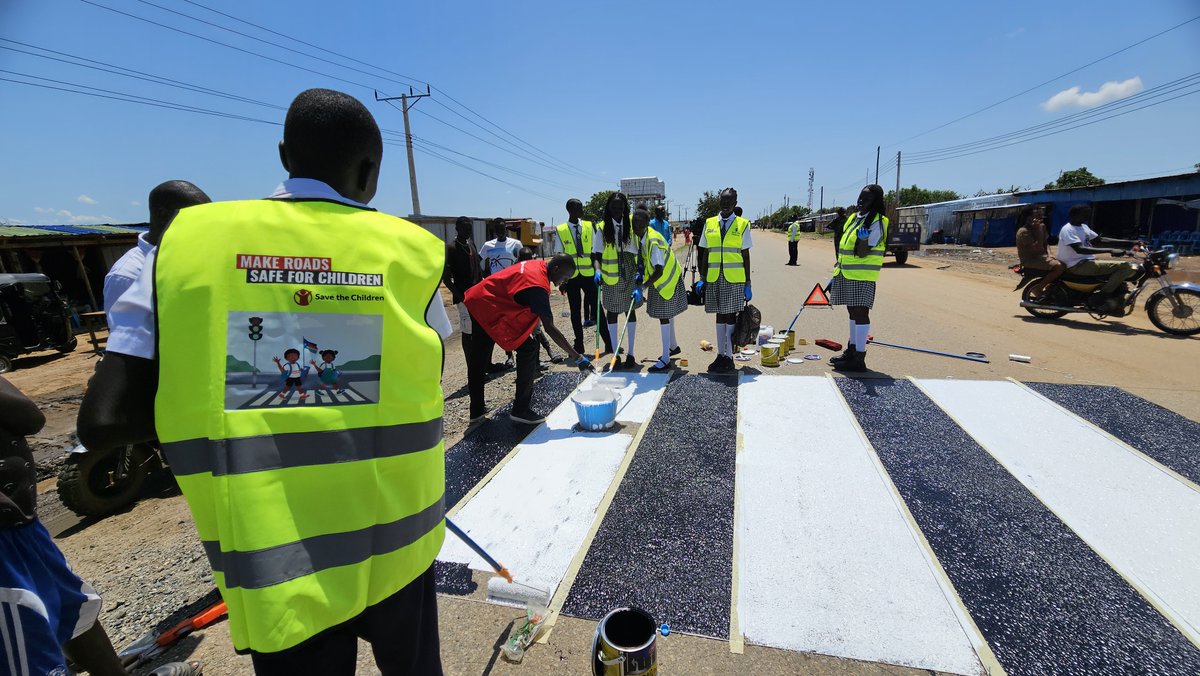 SCSouthSudan's tweet photo. In South Sudan, we're making roads safe for children as officials and children call for increased awareness of road safety in South Sudan. @SCSouthSudan supported a zebra painting activity, a child-led road safety awareness campaign in Juba, on Wednesday 21st. #SSOX https://t.co/u5rY87leLn