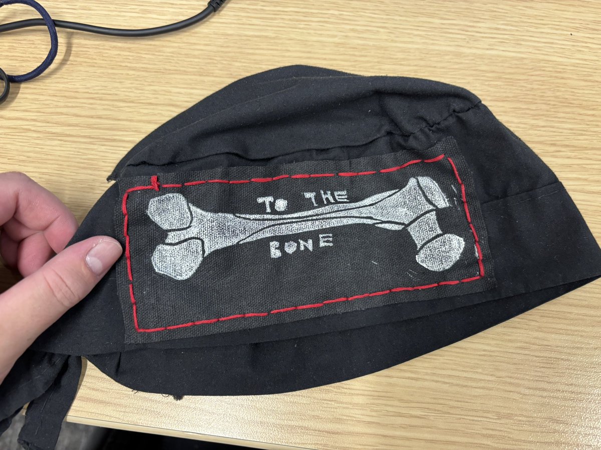 void_apparatus's tweet photo. I made myself a scrub cap battle jacket. The design is a linoleum block print. “To the bone,” because we do orthopedic surgery here, and also I want these clowns (surgeons) to know how hard they work me lol

#surgery #blockprint #blockprinting #linocut #battlejacket https://t.co/kPzOQhlqNS