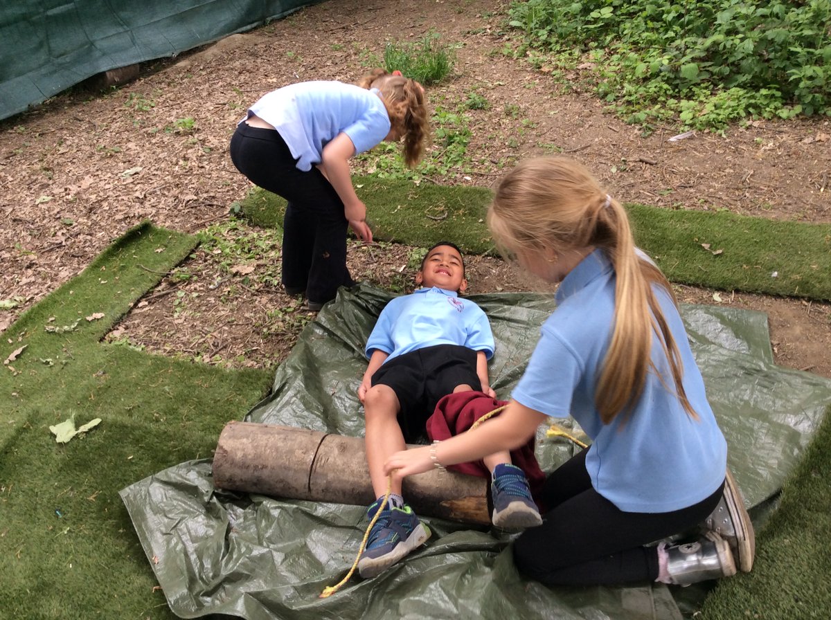 Stradforest's tweet photo. Over the past few weeks, Y2 have been developing their forest survival skills! They've made waterproof shelters, used tools for camp plaques, practised fire-making, and helped friends in forest first aid challenges 🌲🔥 @StradbrokePri https://t.co/aAlH8yW5Mc