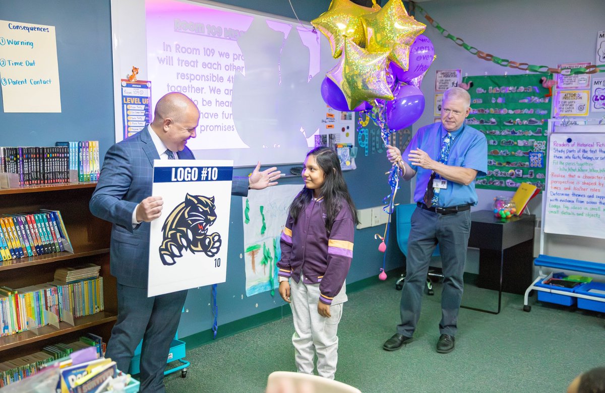 maplemere's tweet photo. Congratulations to 4th grader Raifah Rana whose Panther logo was selected by our community.  Today she was surprised by our district office team with the announcement.  Special thanks to her family for joining us &amp; Mr. Lynch (her art teacher) for all their support. @MaplemerePTA https://t.co/5tczYcWtpR