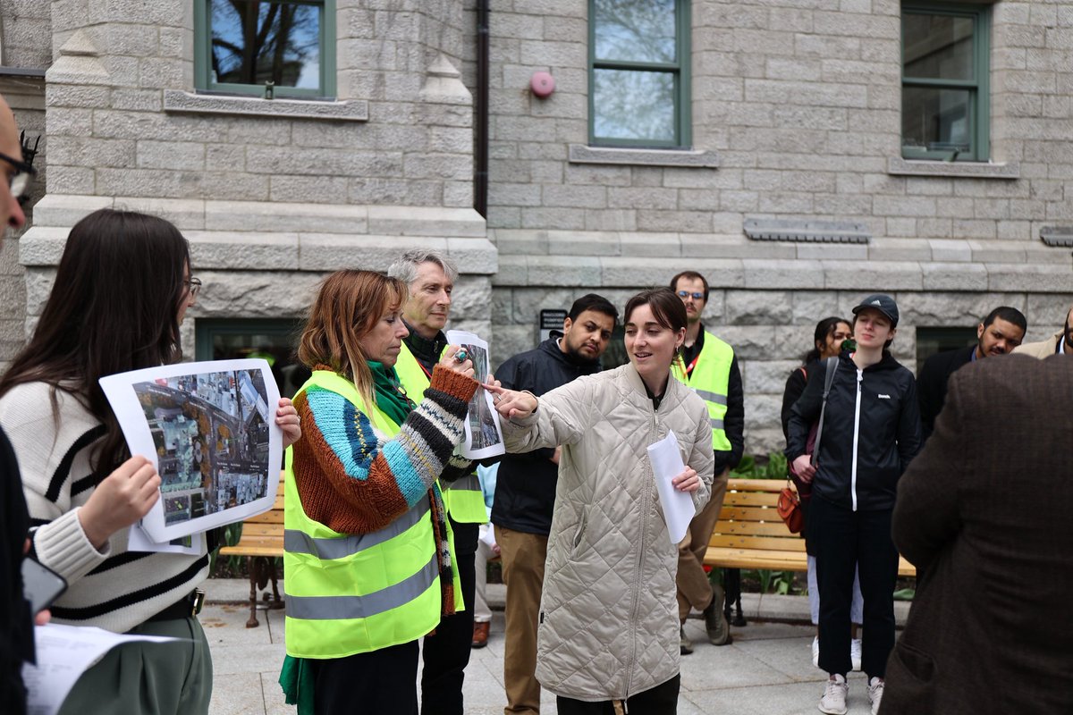 parachutecanada's tweet photo. Next stop on the #walkshop for #CARSP2025 with landscape architect Sophie Tremblay-Gratton, who talks about how a redesign has transformed this hub in front of City Hall from a car-dominated hub to an area inviting and safer for pedestrians #VisionZero #ParachuteVZ @CARSPInfo https://t.co/P8Y8jVstn6