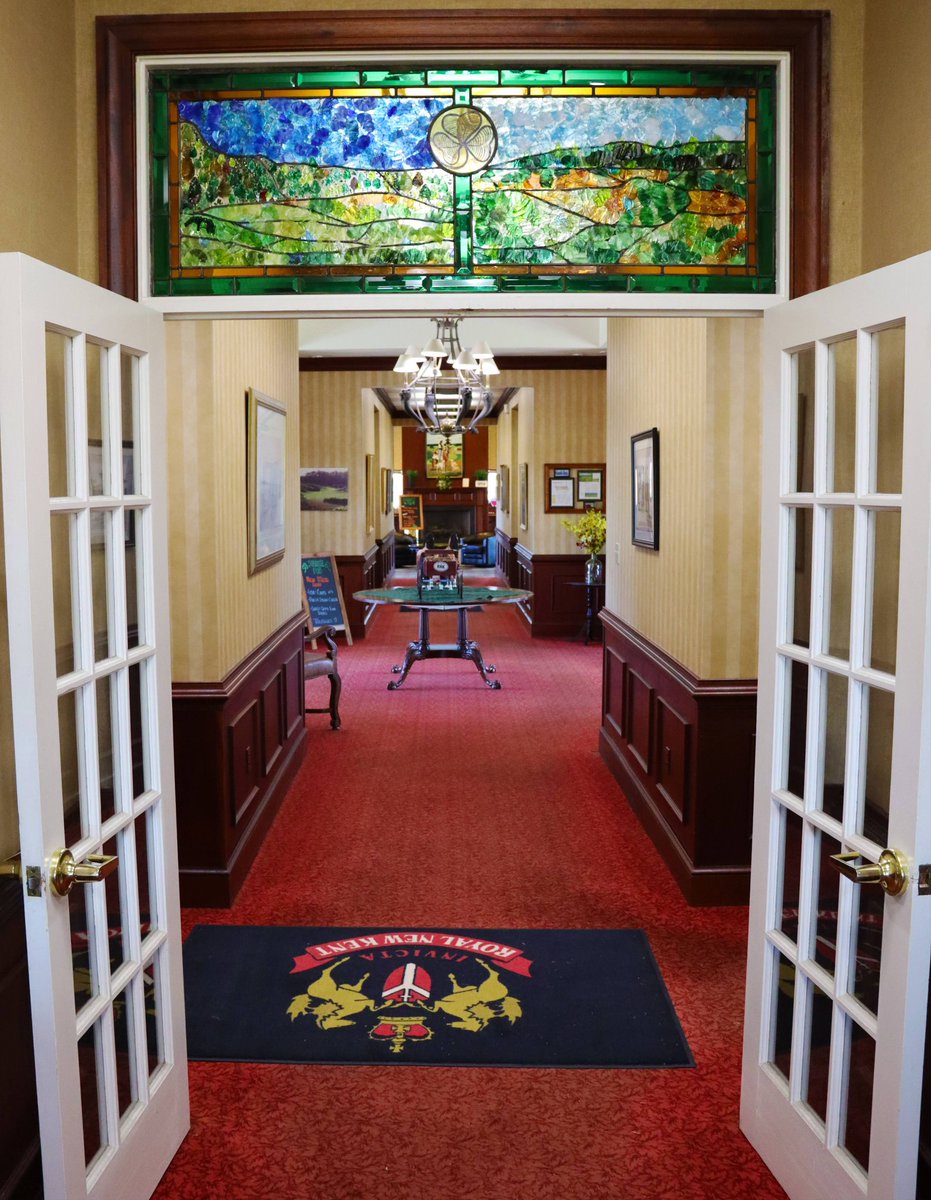 This beautiful stained glass celebrates Mike Strantz's vision of creating an Irish-style course right here in Virginia modeled after his favorite Irish classic, Royal County Down, in Newcastle. The left panel depicts RNK's 7th hole and the right panel depicts RCD's 5th. The