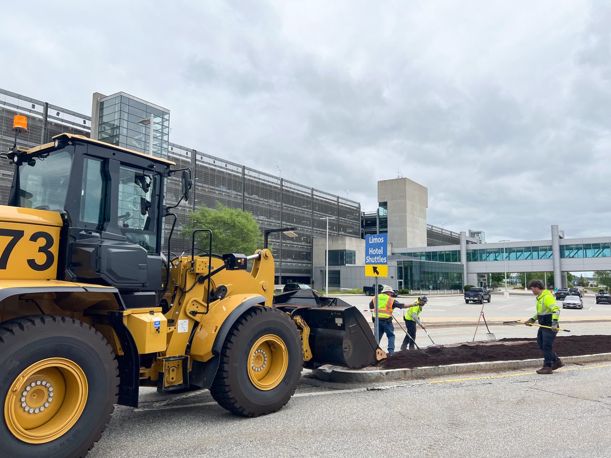 flymanchester's tweet photo. MHT's building maintenance crew has been hard at work this week giving our grounds a spring refresh. 👷🌿 Thanks for keeping MHT looking great! #WorkMHT https://t.co/CZX4DCgP7D