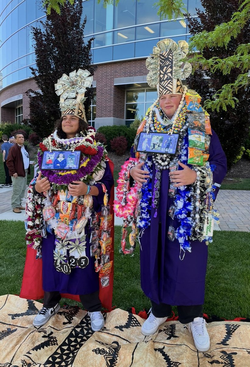Graduating with Tongan family is the coolest thing I’ve ever seen.
<a href="/latu_paul/">Paul Latu</a> and <a href="/TommyRockOlsen/">Tommy Rock Olsen</a> have no idea how incredibly special this is.
The Tongan tradition of family celebration is UNMATCHED.
The Latu family buried these boys in gifts.
Love you all!
Proud of you both!