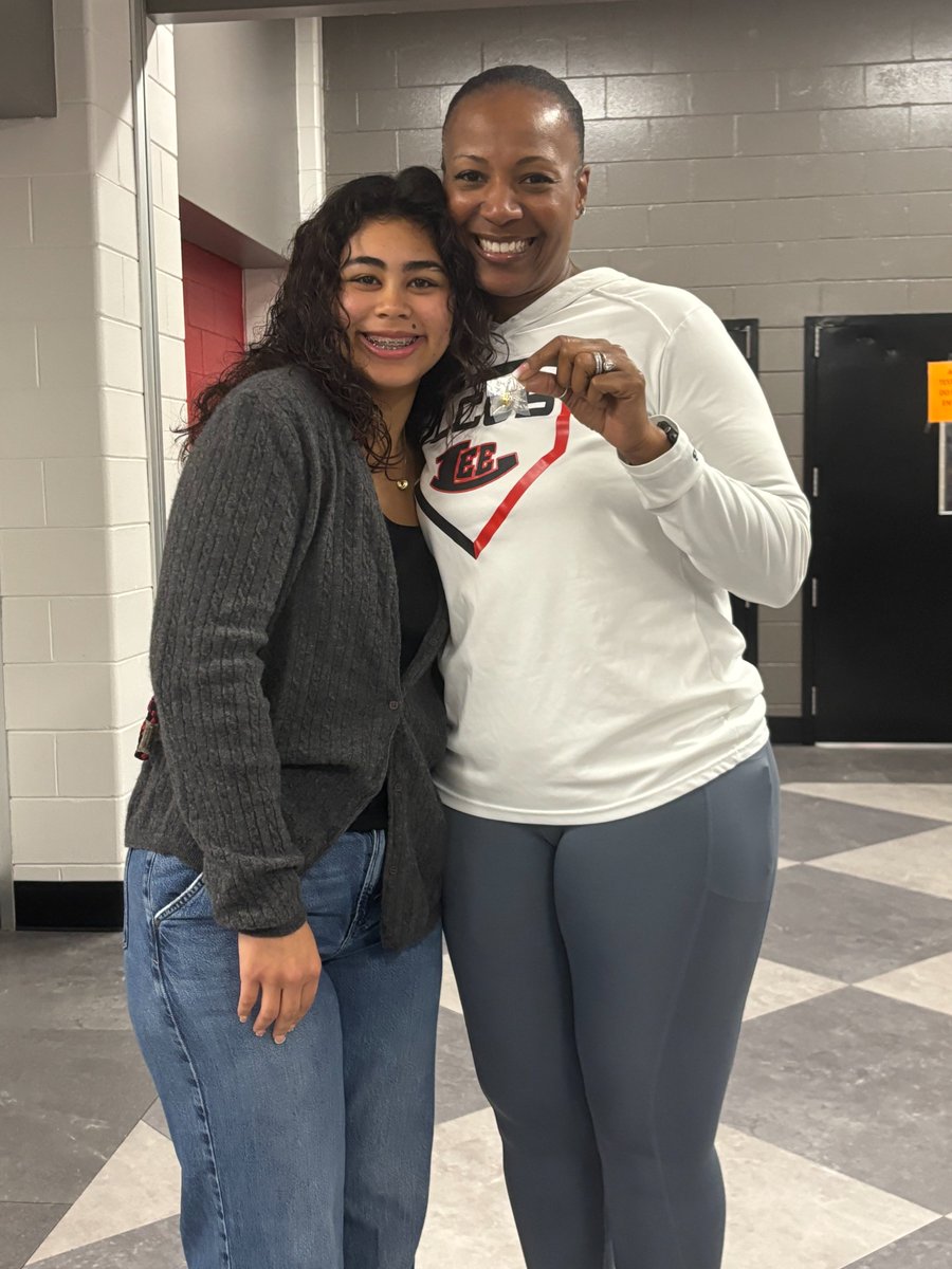 Honor Graduate Lara Shayeb presented her Golden Apple to Coach Tondra Davis. Congratulations to you both.