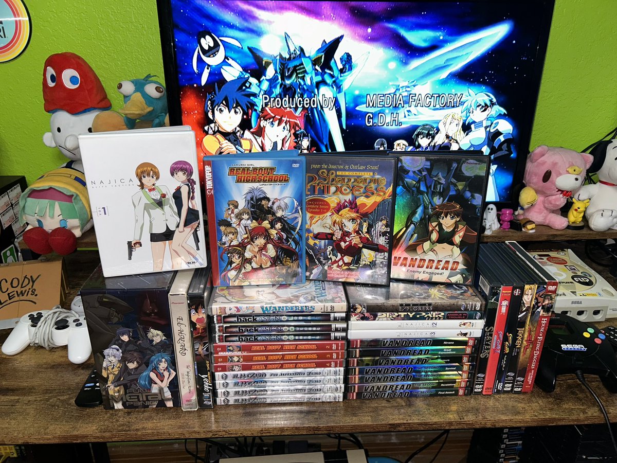 codylagann1998's tweet photo. A re-upload from when my grandma and grandpa bought me a bunch of anime DVDs at a yard sale for 50 dollars back in 2015, and I still have them to this day, as you can see on the second picture. :) #anime #dvd #najica #vandread #elhazard #fullmetalpanic #アニメ https://t.co/lPi92mk3K4