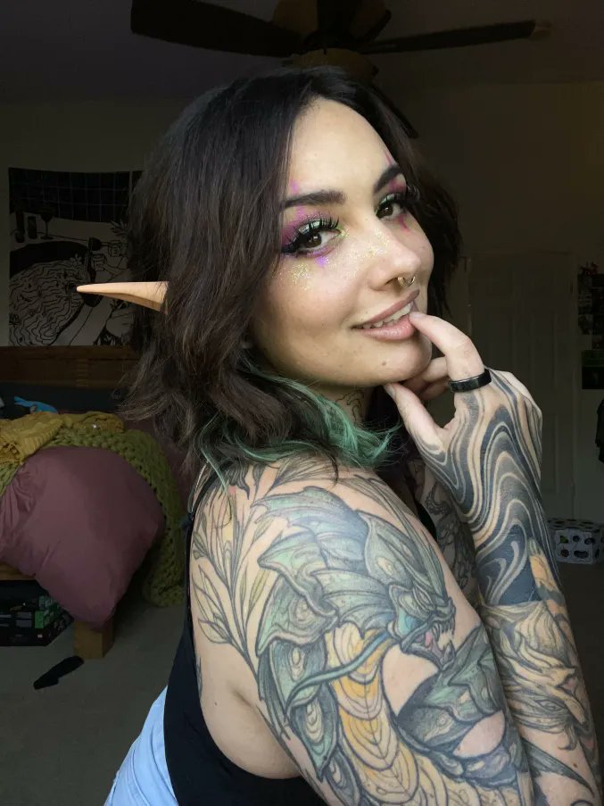 34 year old woman who wears elf ears and clown makeup to work*

*reading tarot online for 5 hours