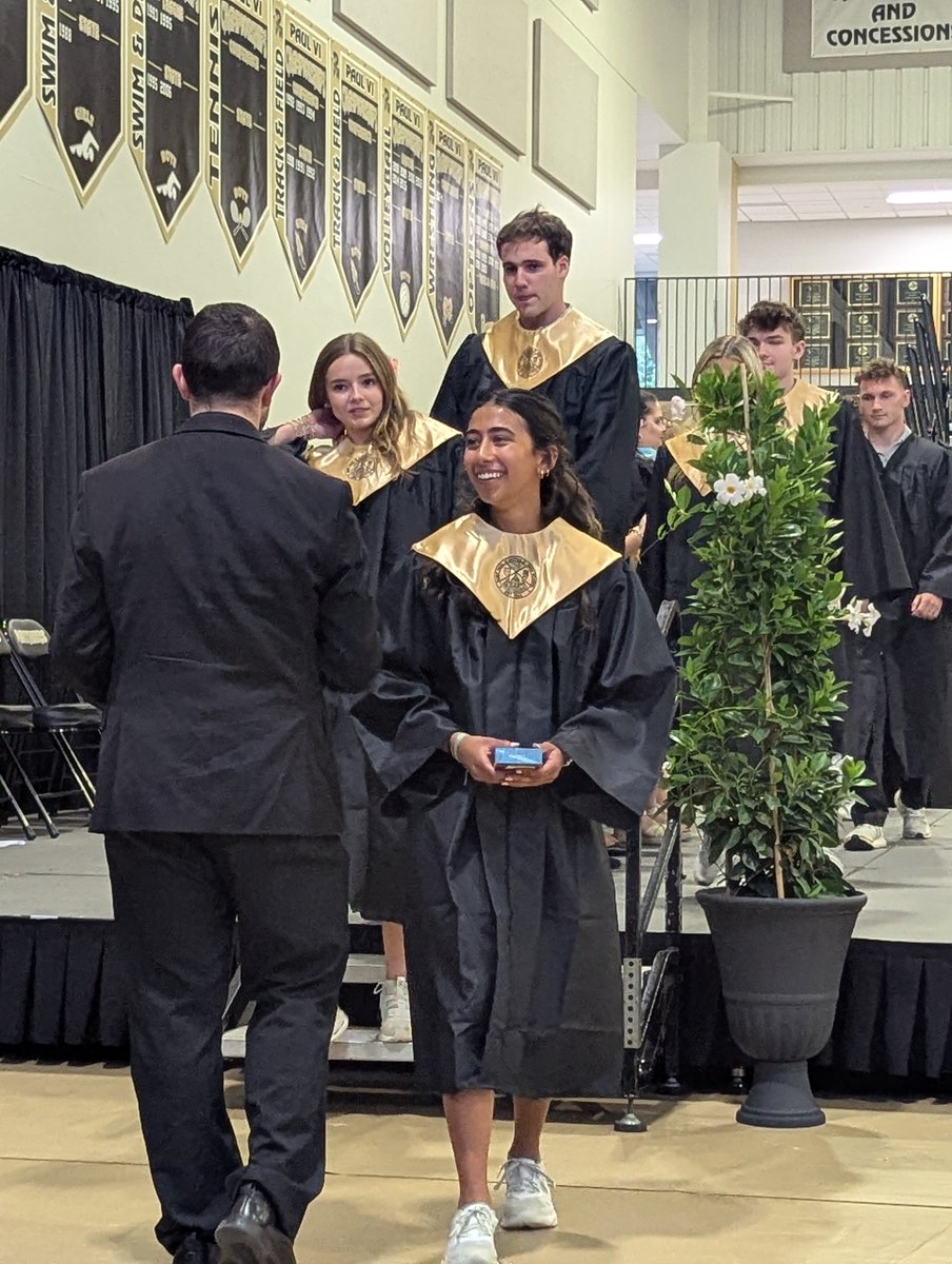 PaulVICatholic's tweet photo. Last night, the #PVIClassOf2025 gathered with their families for Senior Awards Night! 🎓 From hooding to crosses blessed by Bishop Burbidge, it was a joyful evening of fun facts, honors & celebration. 🏅
Thanks to our PPO for the post-ceremony reception! 💛🖤 #PVIProud #PVIGrad25 https://t.co/9Cz0DkREPC