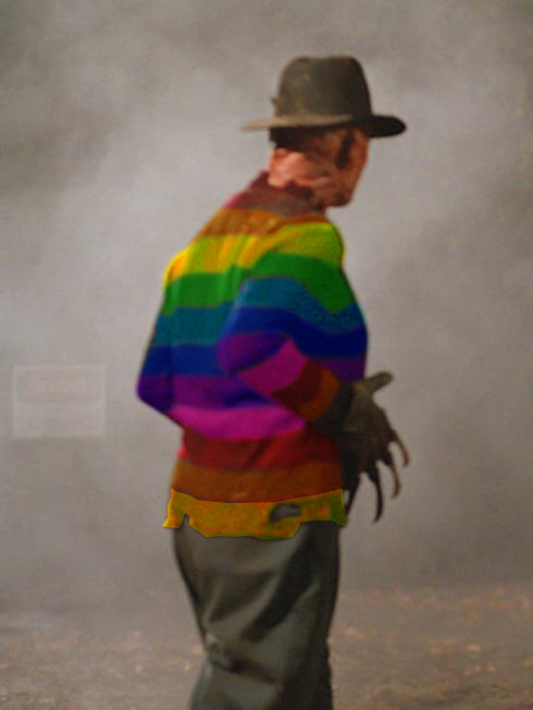 Grindr's tweet image. what kind of f*ggot runs around in a rainbow sweater (during pride szn)