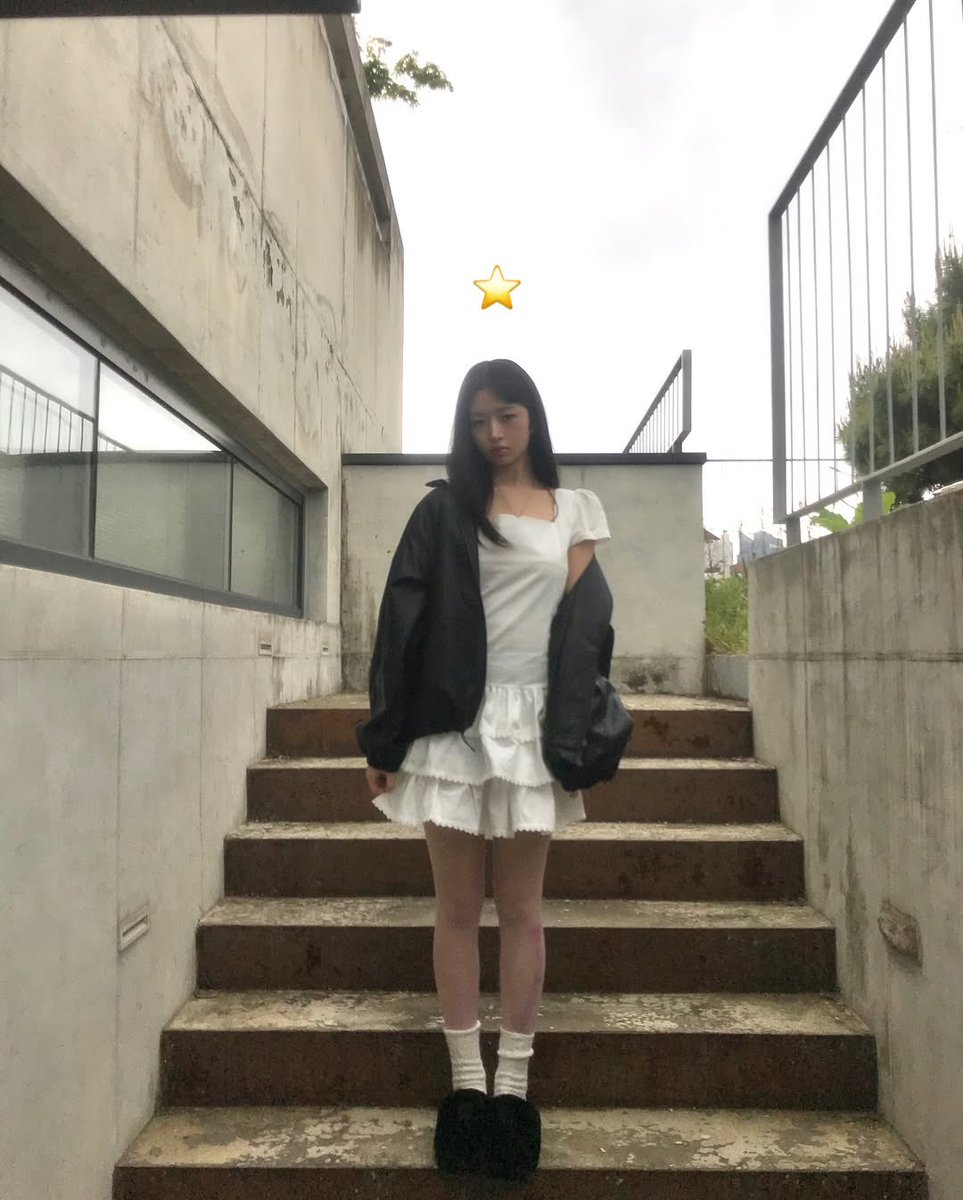 reinfoi's tweet photo. Like a scene from an old song, she sat where time slowed down, and beauty felt effortless. Staying on the stairs but posing a bit—her plain white dress held a kind of charm, the cherry necklace adding a sweet little sparkle that might steal your heart. https://t.co/WeUTKZQOVC