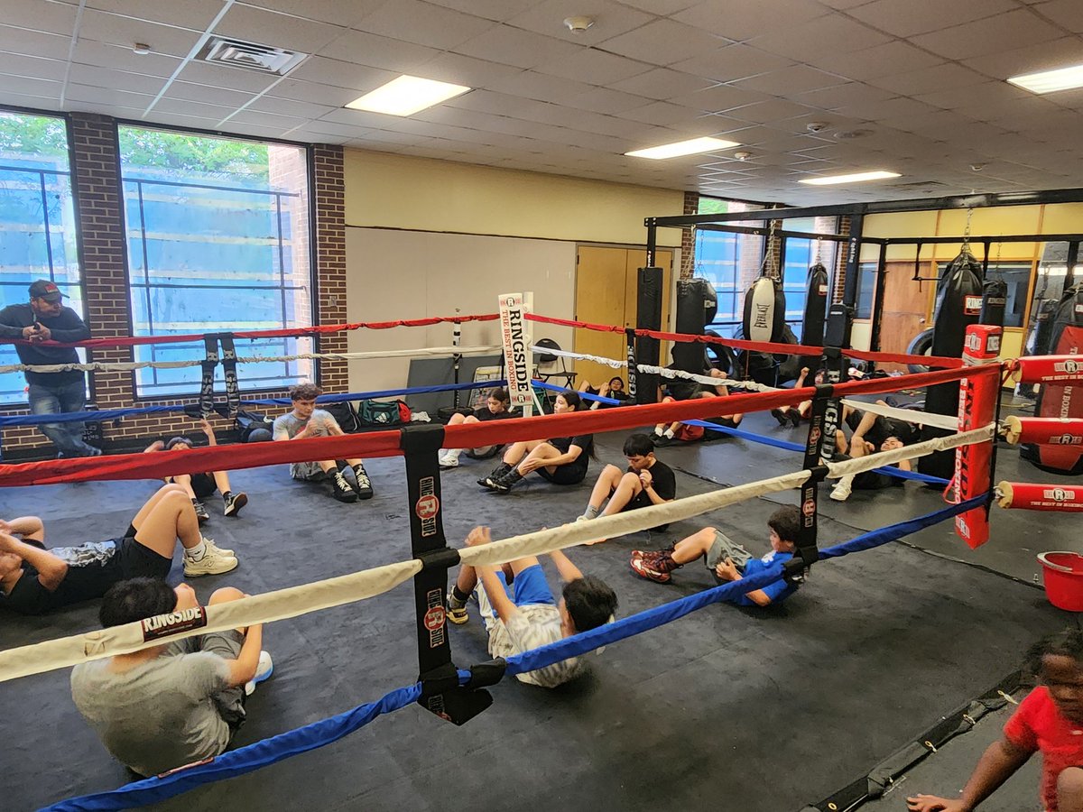 The kids are working on core exercises together at #JanieCTurnerRec.