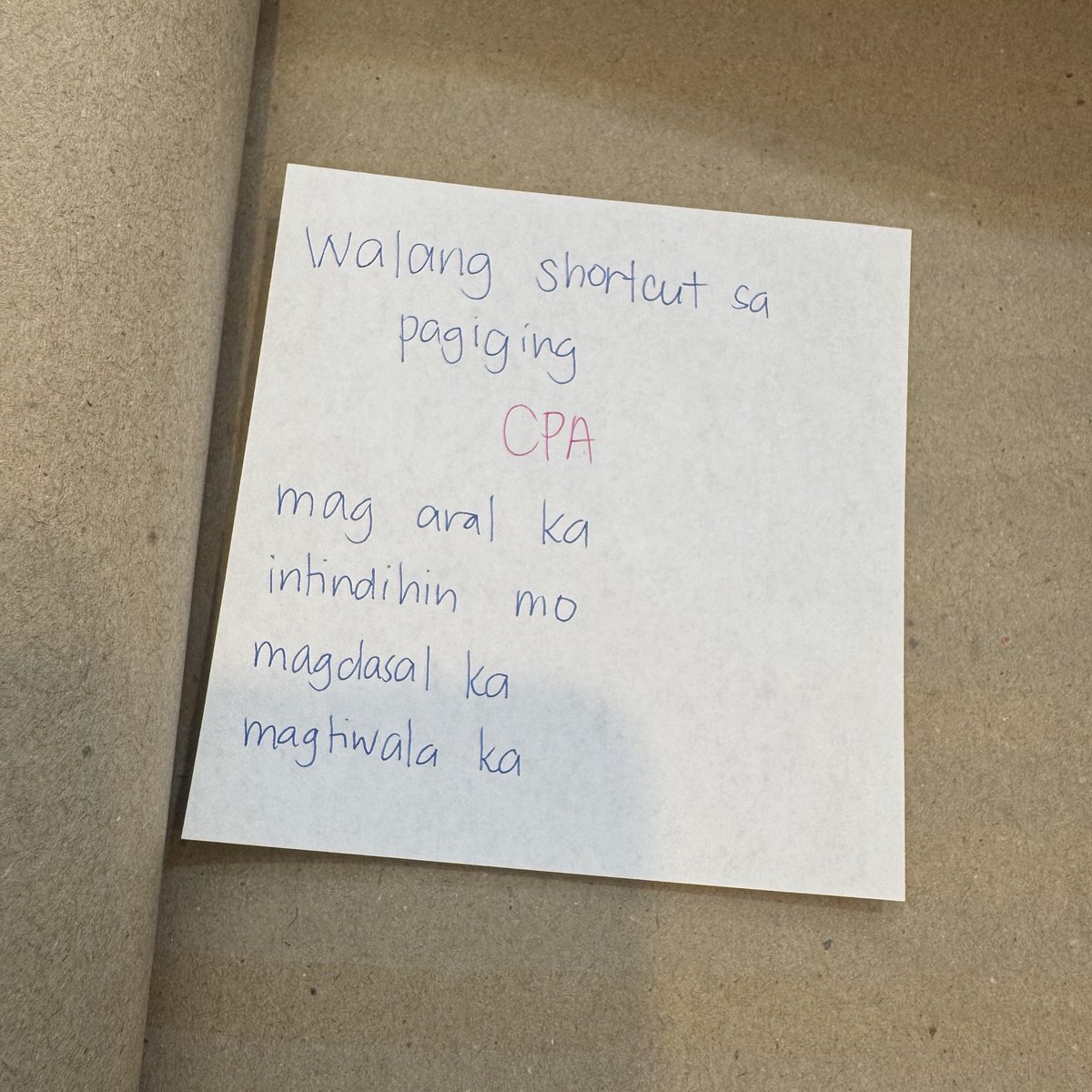binuklat ko yung olddd notebook ko tapos nakaipit to 🥹😭