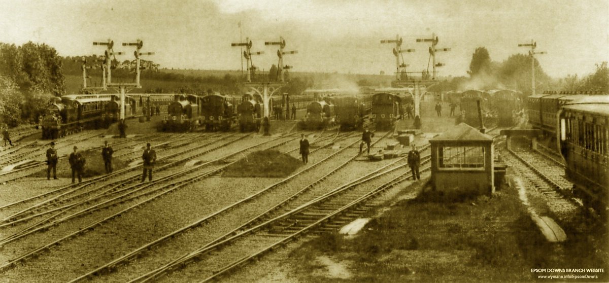 #OnThisDay 160 years ago the branch to Epsom Downs opened including Belmont and Banstead stations. At its peak it had 9 platforms for race traffic, seen here Derby day 5th June 1907 (Lens of Sutton). In 1989 it moved 300m east and the land sold off, its now just a single platform