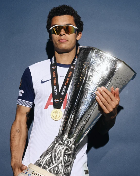 Brennan Johnson with the UEFA Europa League trophy.
