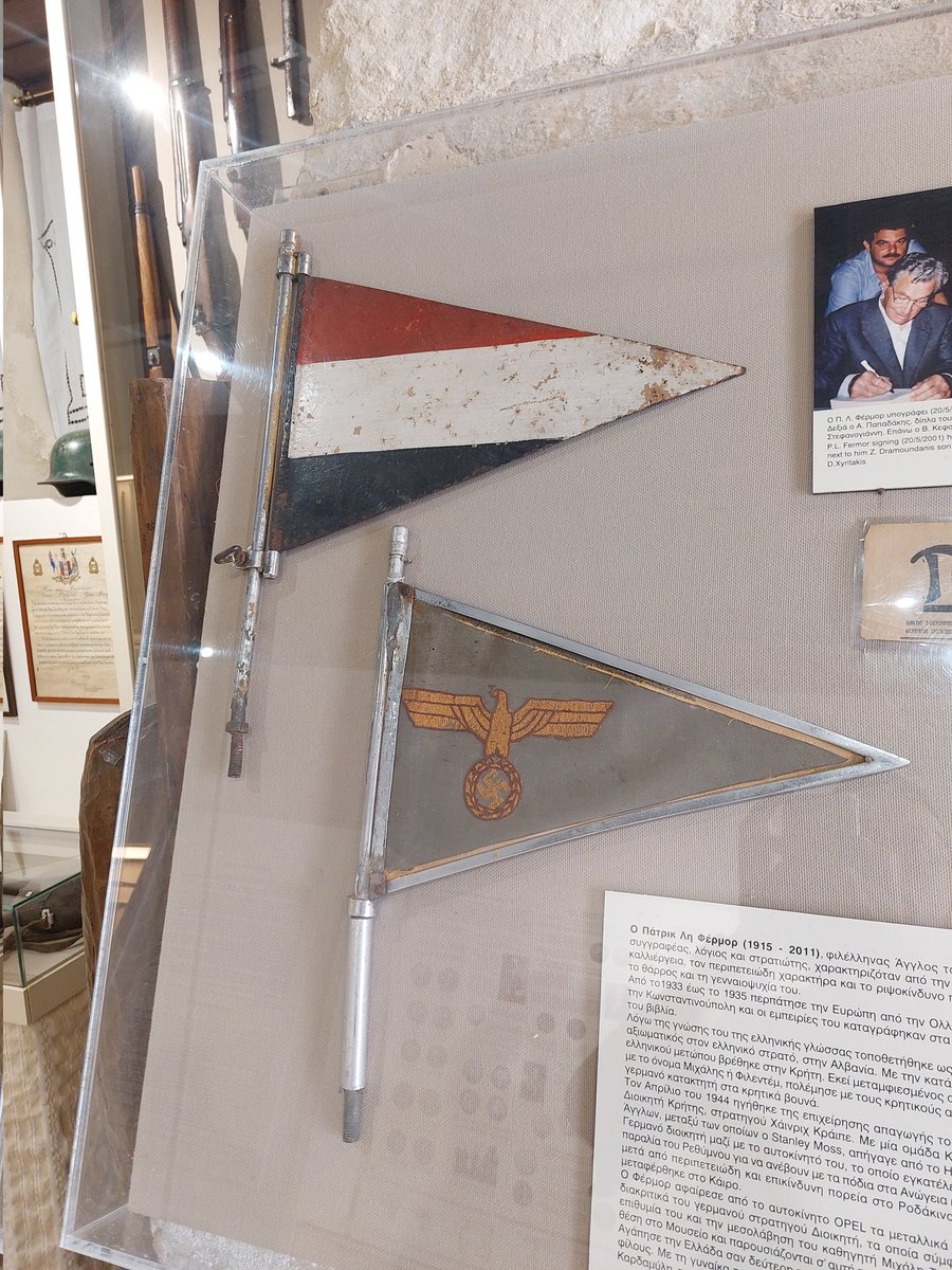 Captured standards!

The pennants from General Kreipe's car, now displayed in the Folklore Museum in Rethymnon.

"Then – we couldn’t resist it – we each broke off one of the flags which had served us so well. I gave mine to George who waved them both, saying, ‘Captured