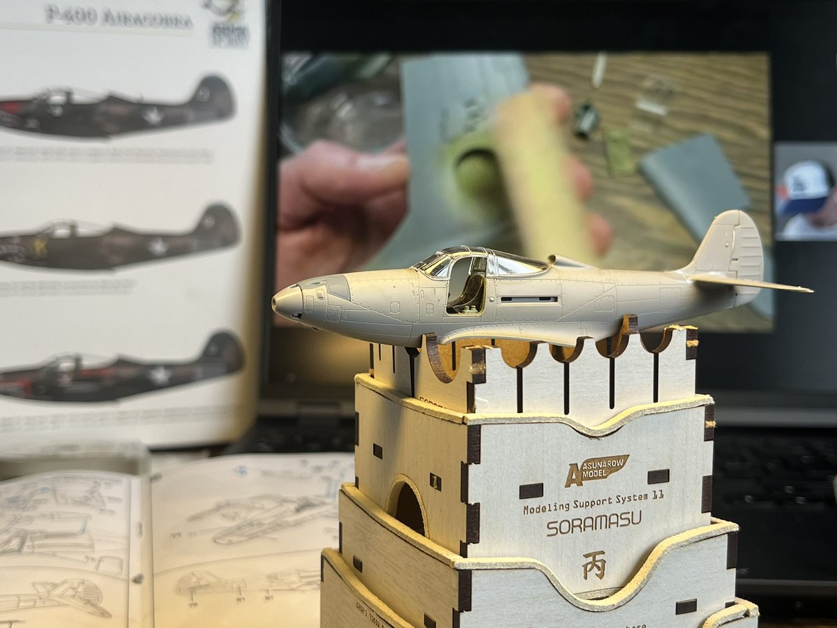 Also back on the <a href="/ArmaHobby/">Arma Hobby</a> P-39, with the Soramasu holder gifted by <a href="/205Hobbies/">205 Hobbies</a>, and the latest <a href="/rinaldi_rsp/">Rinaldi Studio Press</a> Patreon stream, discussing the P-40 GB and Cockpit painting. 
I will make the P-39 into an Alaskan one, and will likely put it on a base with water/mud etc.