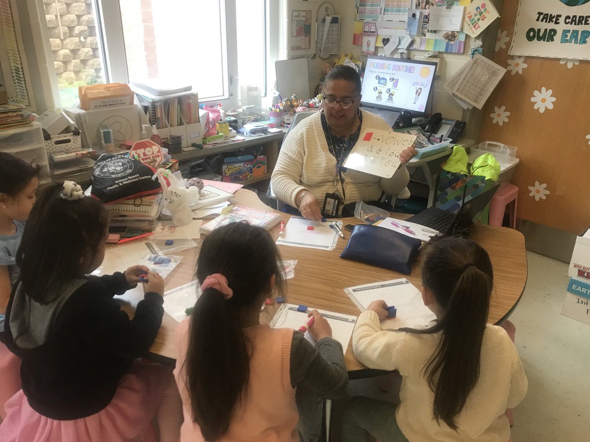 eemajor's tweet image. Shout out to Mrs. Bravo for sharing the Arcola love of vowels with her reading group!