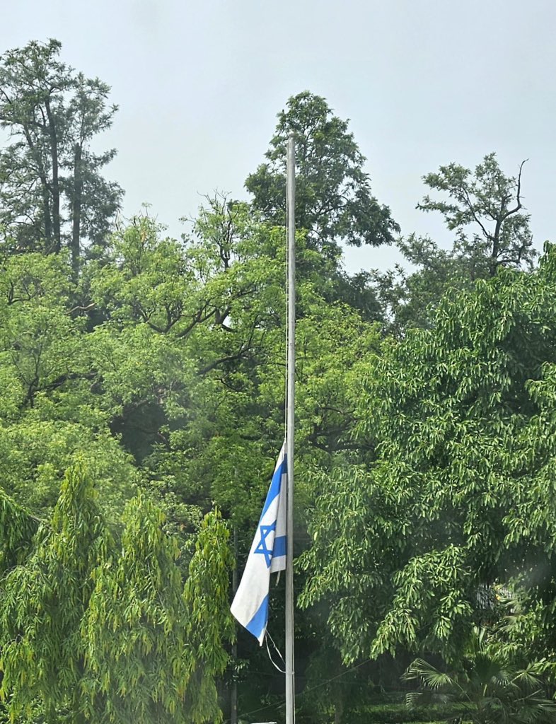IsraelMFA's tweet photo. Following the horrific terror attack in Washington, D.C., in which our colleagues Yaron Lischinsky and Sarah Lynn Milgrim were murdered, Israeli flags at the Foreign Ministry and at missions around the world have been lowered to half-mast in mourning.

We are heartbroken. 💔 

May Yaron and Sarah’s memory be a blessing. 🕯️
