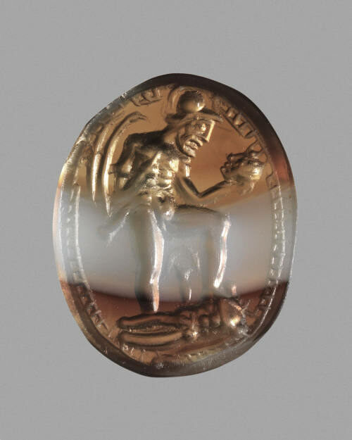 Agate intaglio depicting a warrior contemplating a decapitated head, Greek Southern Italy, 2nd century BC, from The Michael C. Carlos Museum, Emory University