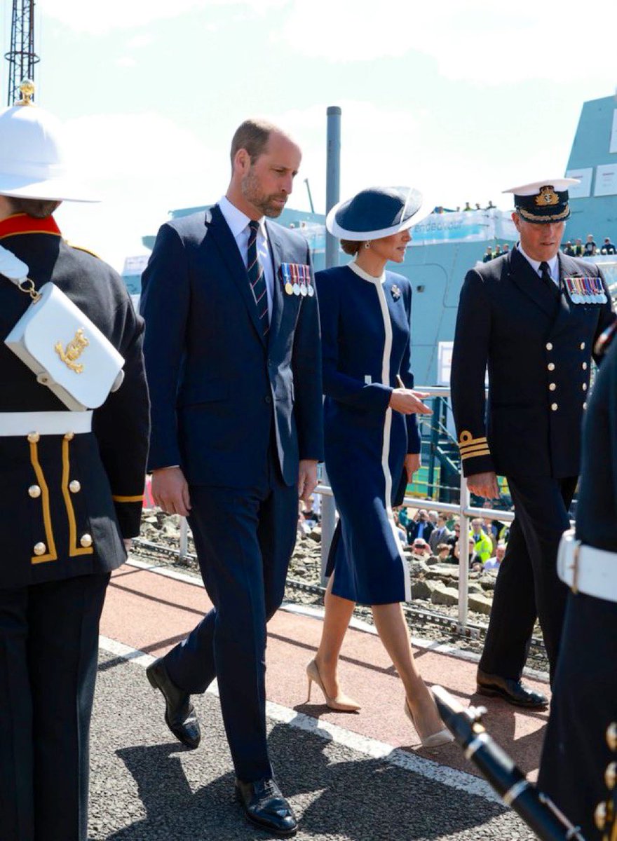 Canellelabelle's tweet photo. One again, the Queen of sartorial dressing strikes again👏🏽
How appropriate is this pencil white and navy dress for an engagement with Royal Navy?🤩 
    Which designer is about to be sold out in 24 hours today?😂
how lovely and posh does she look?😍❤️👌
#PrincessofWales https://t.co/JT8G3fGjax