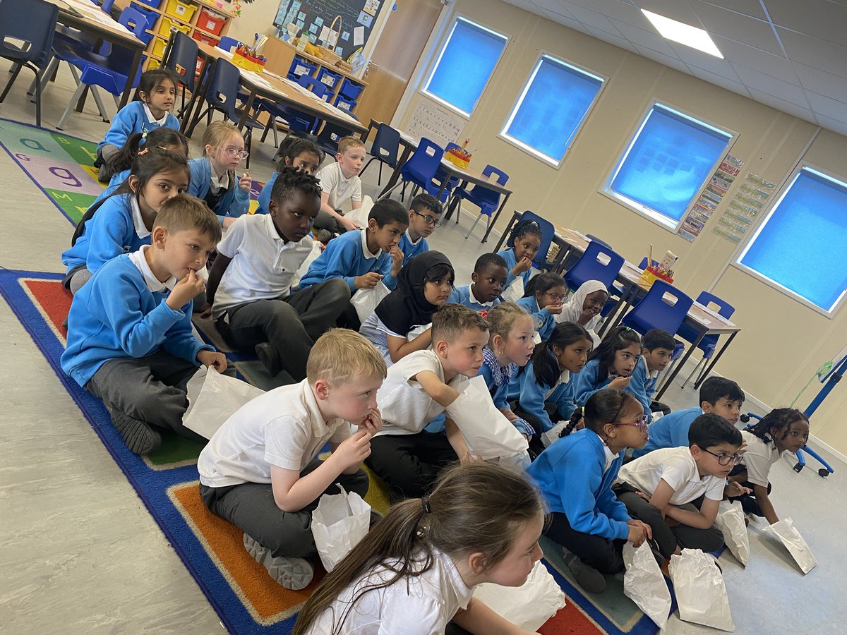 1B enjoying a treat of popcorn and a film for winning the attendance award 🥇