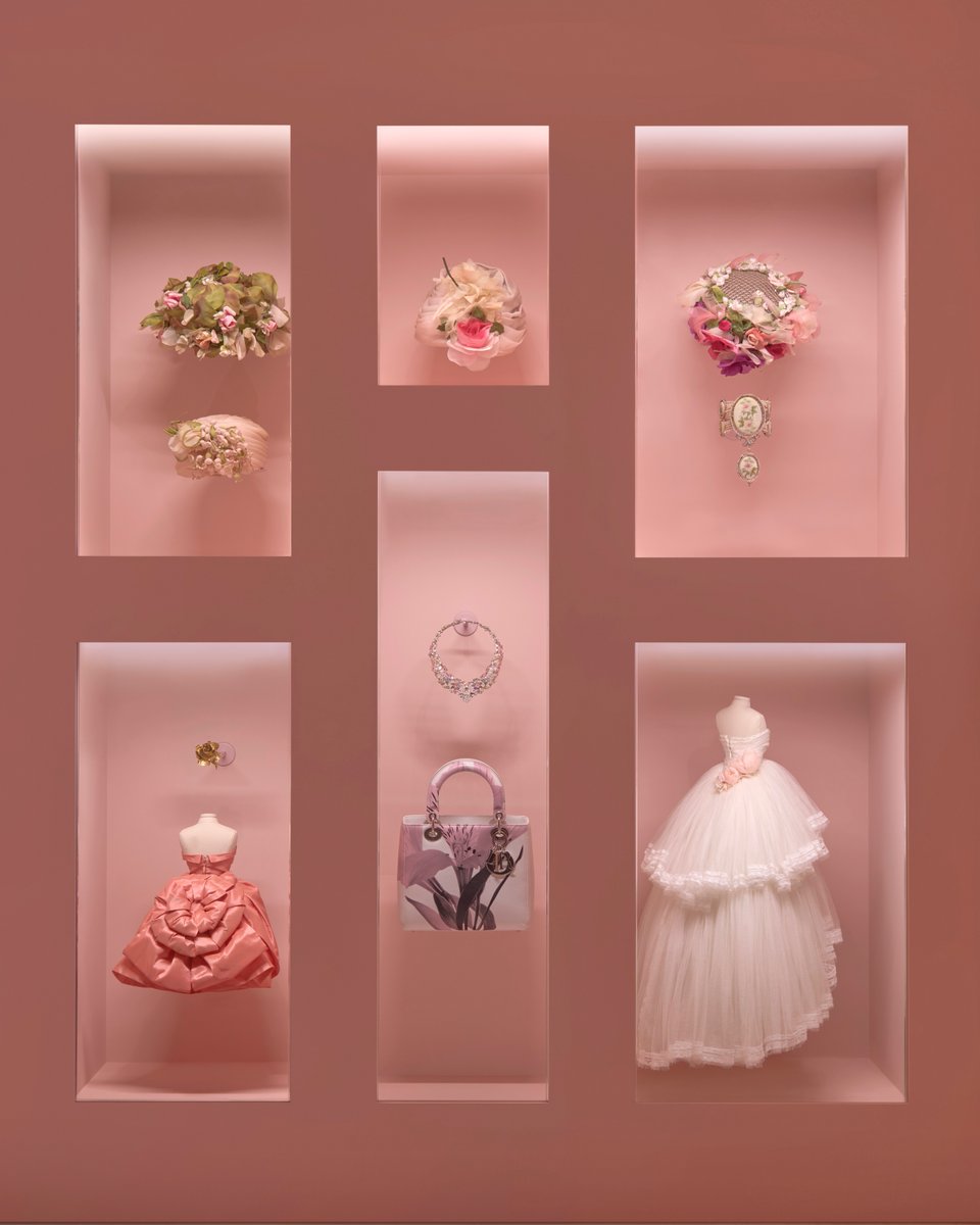 Dior's tweet photo. Silhouettes bloom and miniature treasures glimmer across a cabinet of curiosities brimming with jewels, bags, and scents–'Christian Dior: Jardins Rêvés' at @ScadMoa is a fantasia stitched with wonder. https://t.co/9RlS0NWZMl