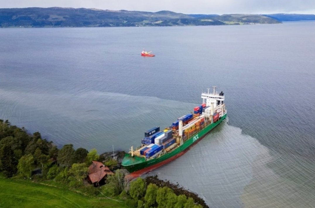 135-metre cargo ship, NCL Salten, crashes into homeowner's garden,(Norway’s Trondheim fjord) barely missing his house: 'My neighbour knocked on the door and asked if I had seen the ship' (📸ANP / Jan Langhaug / NTB / AFP)