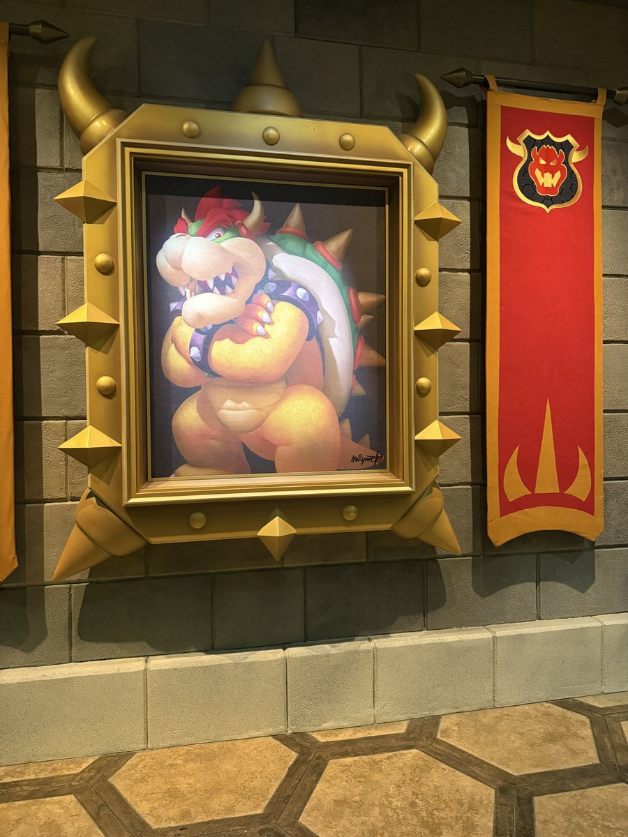 ParkHoppin's tweet photo. Miyamoto’s signature spotted on a Bowser portrait on the Mario Kart ride at Epic Universe 👀 https://t.co/8kndNA76EJ