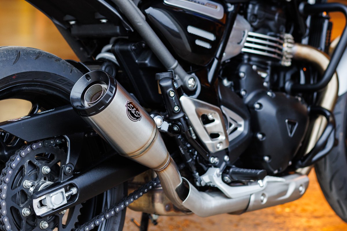 Your Triumph deserves nothing less than the S&amp;S Grand National Slip-On Exhaust. Crafted from raw brushed stainless steel and tucked tight against the bike. Adding to the sound is a removable dB reducer that allows a rider to tune the sound and performance of the exhaust.  
1/2