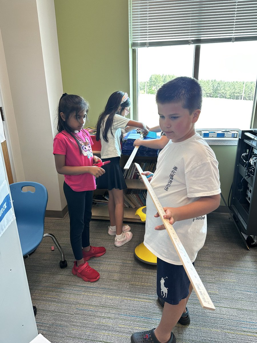 We used collaboration and a growth mindset in our math performance task today: making a paper chain two yards long with ONLY one piece of paper, scissors, and glue!