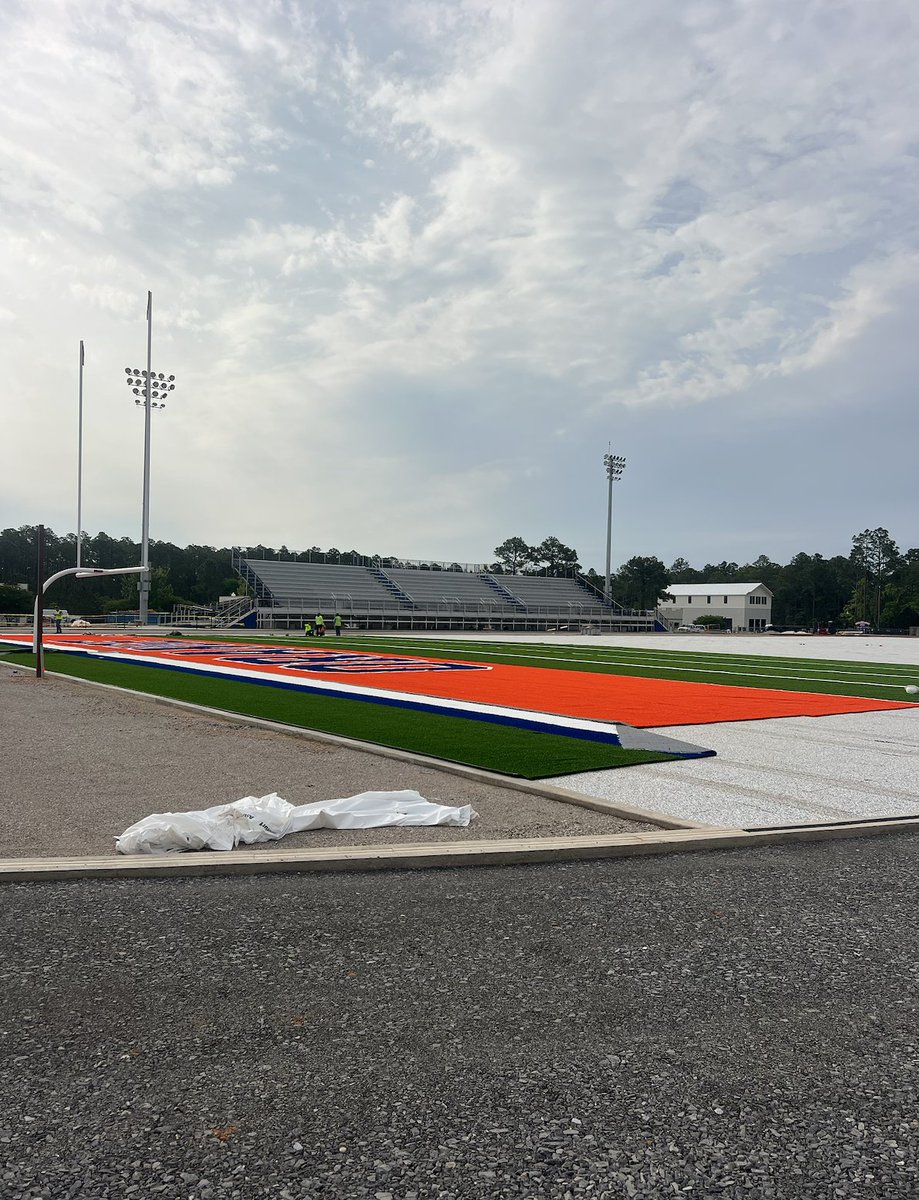Turf installation is nearing completion on Orange Beach High School's stadium field as a part of the brand new state-of-the-art athletic complex. The full scope of the project includes: an 8-lane running track, track and field events, artificial turf stadium field, indoor