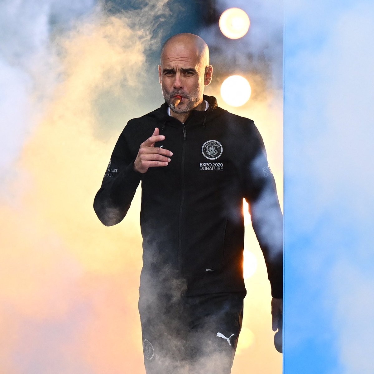 City_Xtra's tweet photo. One of the most iconic Pep Guardiola photos ever taken, three years ago today. 🥶 https://t.co/M0AaSuX30C