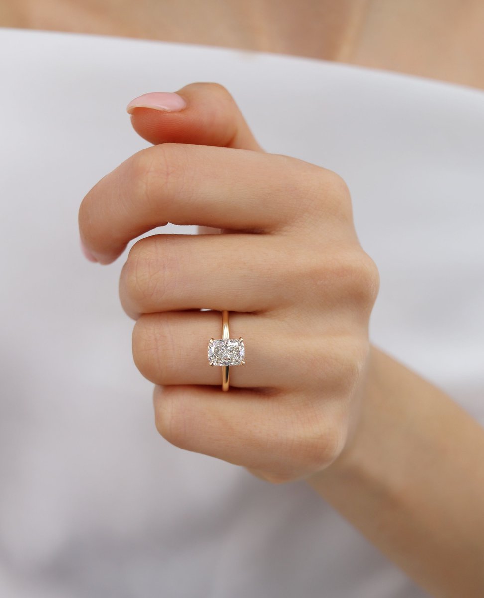 Unveil a touch of hidden luxury.

The Paris ring’s concealed halo delicately frames its elongated cushion lab diamond, set atop a slender band for effortless elegance. 

🔗 bit.ly/45G9gQ0
📧 hello@lilyarkwright.com ⁠
📞+44 (0) 161 537 6773⁠