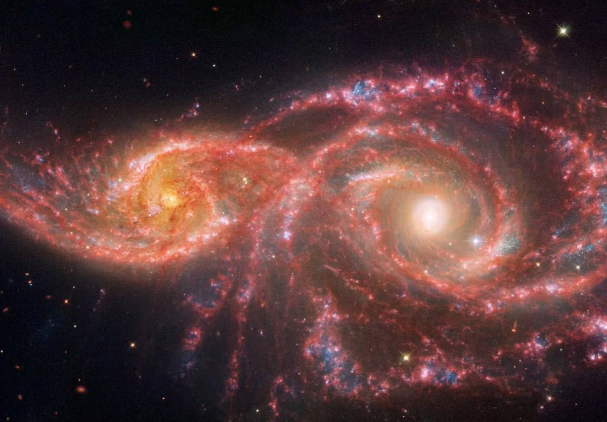 Galactic Eyes - A Pair of Galaxies IC 2163 and NGC 2207

They are located about 80 million light-years from Earth. The diameters of the galaxies are approximately 90,000 and 60,000 light-years, respectively.

The galaxies IC 2163 and NGC 2207 collided about a few million years