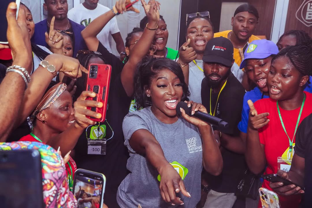 Lagos Food Bank (@lagosfoodbank) on Twitter photo Today at the Lagos Food Bank, the incredible <a href="/Ms_DSF/">Dorcas Shola Fapson</a> didn’t just show up; she showed out!
While lending her hands to pack food boxes for vulnerable families, she also jumped on the microphone to hype up and energize our volunteers, turning the warehouse into a space of joy, Today at the Lagos Food Bank, the incredible <a href="/Ms_DSF/">Dorcas Shola Fapson</a> didn’t just show up; she showed out!
While lending her hands to pack food boxes for vulnerable families, she also jumped on the microphone to hype up and energize our volunteers, turning the warehouse into a space of joy,