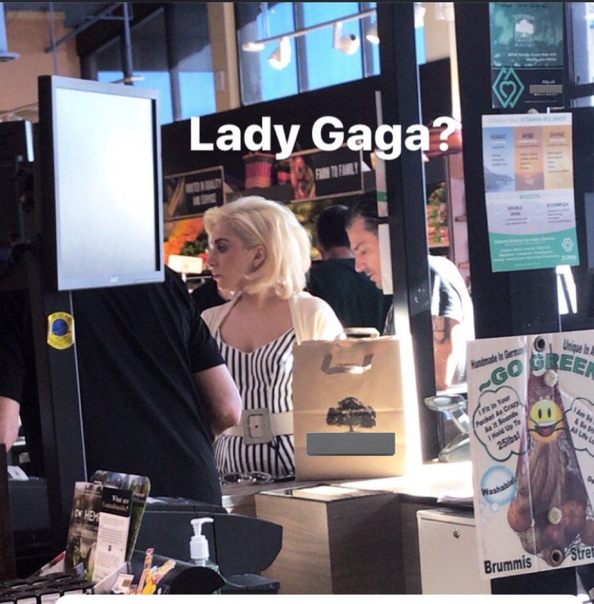 artemxcx's tweet image. i was just looking for a nearby store to buy water and why there’s literally a picture of Lady Gaga in the reviews on apple maps 😭