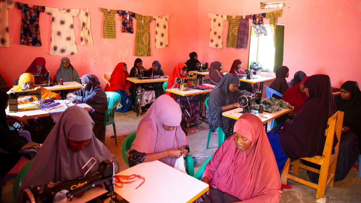 NRC_EAY's tweet photo. #Somalia: 29 talented young women at Galgadud Technical School are mastering tailoring &amp; tie-and-dye, a significant step towards self-reliance for themselves, their families &amp; their communities. This #TVETprogramme, part of the #JRPProject with @WFPSomalia is funded by @Kfw_int. https://t.co/BXGYzbYX5n