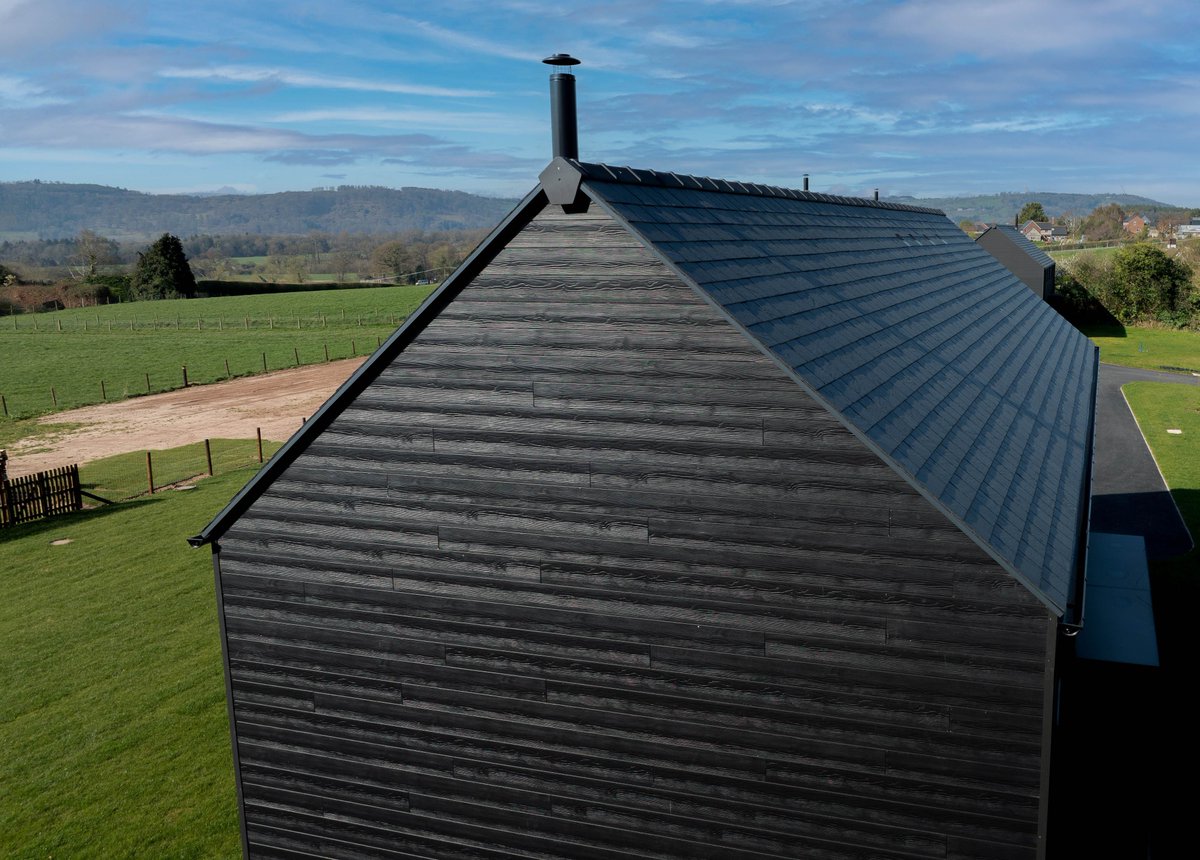 This bold three-home project shows just how transformative our charcoal composite cladding can be.

⚒️ Craftsmanship by S. A. Morgan Carpentry

👉 Thinking of elevating your exterior space? Click here:
cladco.uk/44mqELo

#Cladco #CompositeCladding