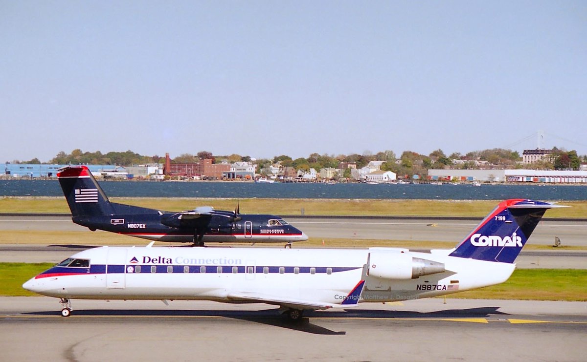 n194at's tweet photo. Delta Connection (Comair) 
CRJ-100ER N987CA 
US Airways Express (Allegheny Airlines)
DHC-8-102 N807EX
LGA/KLGA New York LaGuardia Airport
Date: 1998 
Photo credit Matthew J. Destatoff 
#AvGeek #AvGeeks #CRJ #DHC8 #LGA @LGAairport #DeltaAirlines #Comair #USAirways #Allegheny https://t.co/RsTkL5UUSg