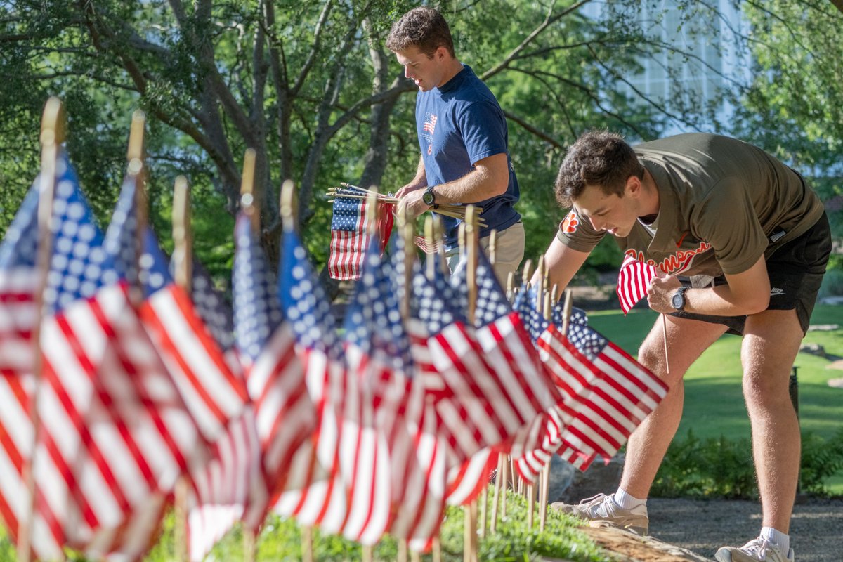 A group of Clemson Family patriots, including student body president Zach Freeman, gathered on a mild Thursday evening last night to crown the Scroll of Honor with American flags for Memorial Day. #MemorialDay  #NeverForget