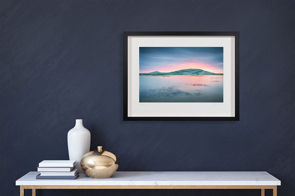Mullaghmore Sunrise, The Burren, Co Clare

Bathed in the gentle glow of sunrise, the striking limestone form of Mullaghmore rises above the waters of Lough Gealáin. 

Check out prints via link in bio.

#theburren #mullaghmoreburren #loughgealáin #visitclare #irishwallart