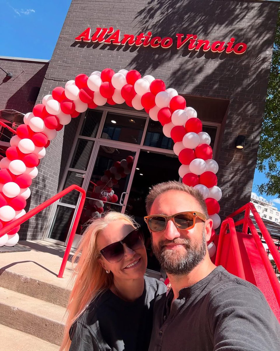 Just a girl and her guy eating up sammies….and smiles…one bite at a time!