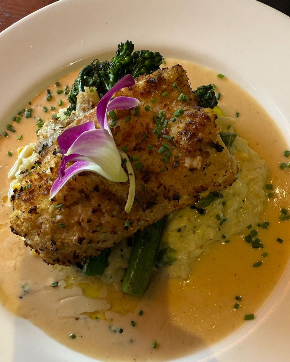 This is so good, we have decided to offer it all weekend...🌴

Coconut-crusted Mahi Mahi with savory lobster corn risotto, roasted broccolini, and sweet and sour beurre blanc to finish this beautiful dish. 🥥🐟

Let's celebrate with good food, good wine, and good people!