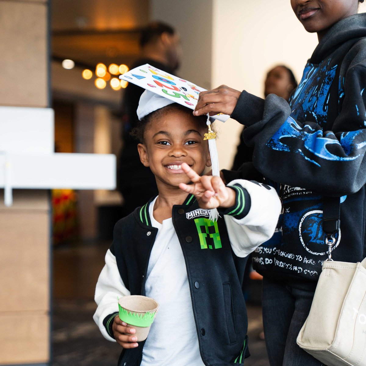 NAZMpls's tweet photo. ALWAYS one of our favorite days of the year–watching our Family Academy graduates BLOOM! We had 60 graduates walk across the stage last Saturday to receive their certificate of completion for any one of our Family Academy classes. https://t.co/uxPtj8TDLk