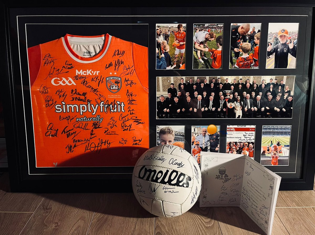 First communion card and presents pride of place. Special thanks to <a href="/NeillOisin/">Oisín O'Neill</a> <a href="/Conor_Glass/">Conor Glass</a> <a href="/Canavan71/">Peter Canavan</a> <a href="/starryboy14/">Kieran Donaghy</a> and <a href="/BBCMarkSimpson/">Mark Simpson</a> - not many with a communion card from the reigning All Ireland champions <a href="/Armagh_GAA/">Armagh_GAA</a> <a href="/thomasniblock/">Thomas Niblock</a>